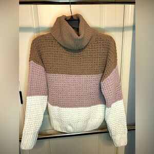Cute, tri colored sweater.